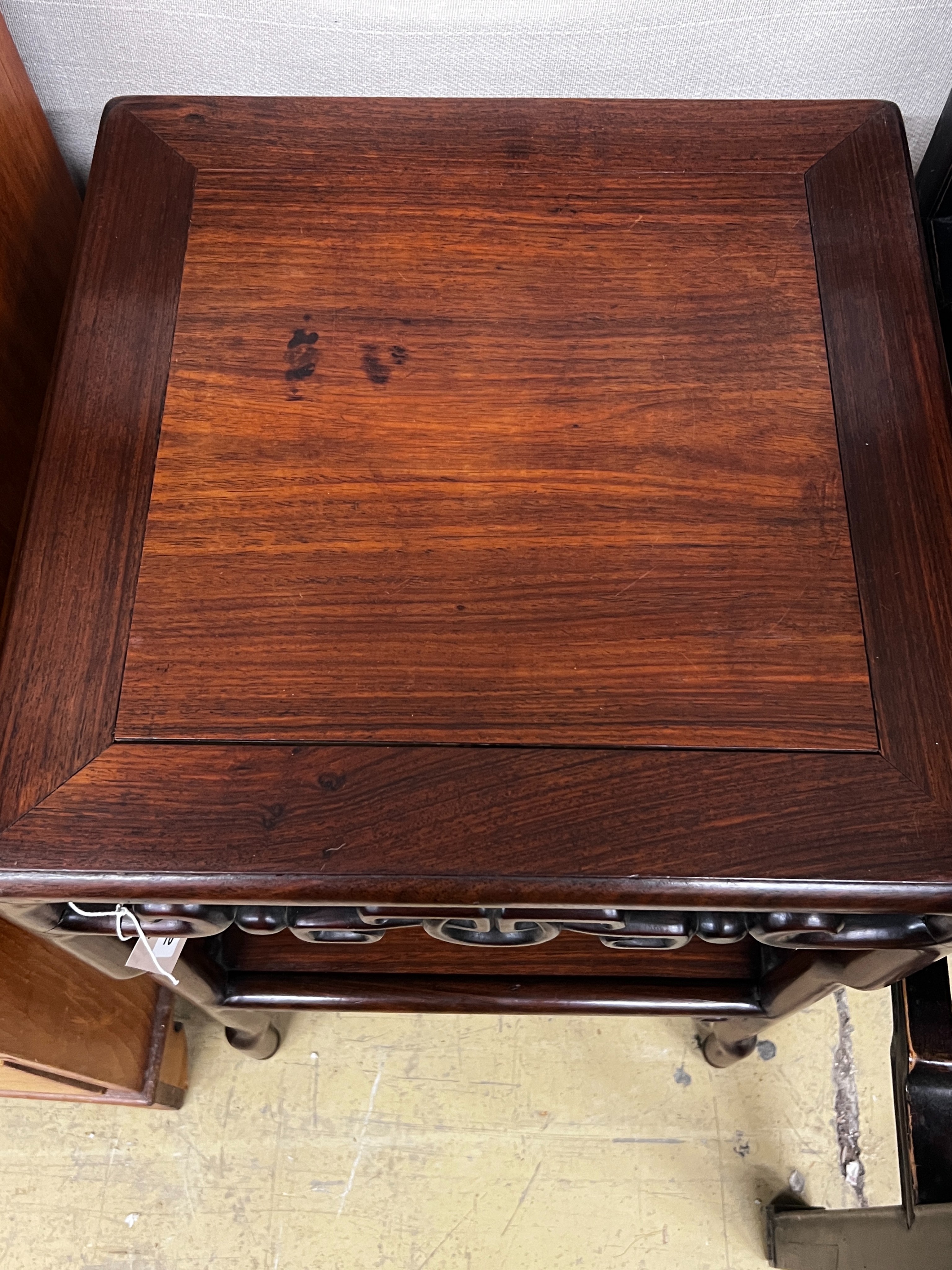 A Chinese carved hongmu two tier table, width 45cm, depth 45cm, height 73cm